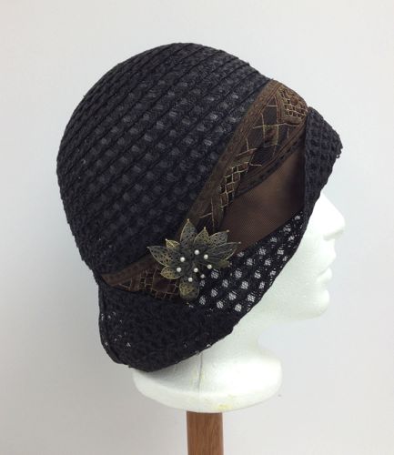 This black straw hat was made from reclaimed straw braid.